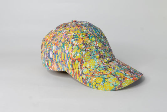 Colorful patterned baseball cap on a gray background